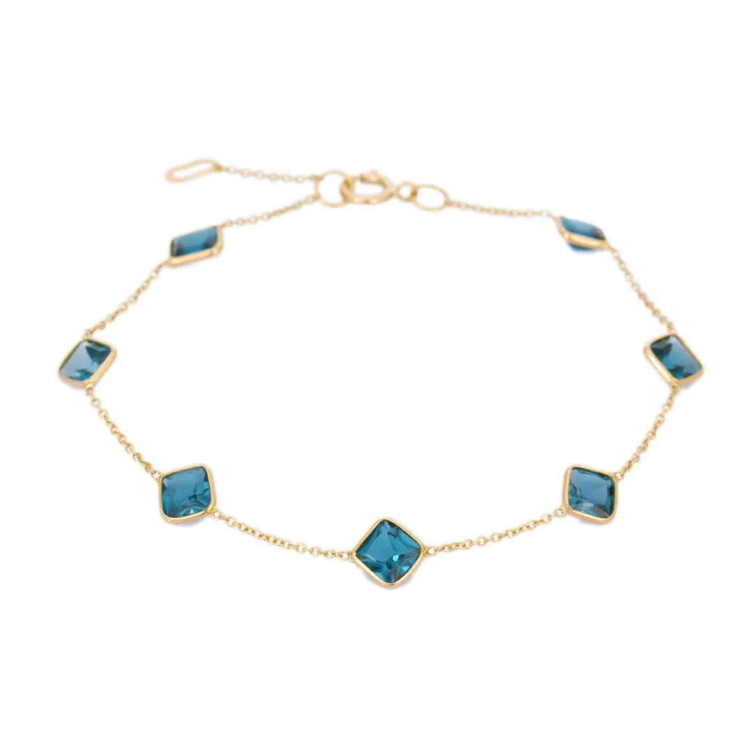 18K Yellow Gold Bracelet With Blue Topaz Gemstone