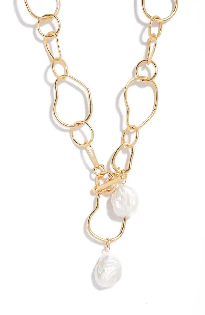 Organic link and flat pearl dangle necklace