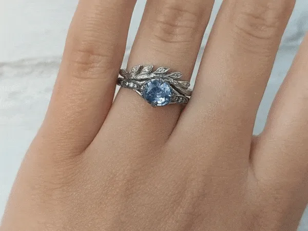 Platinum and Blue Sapphire Petal Side Ring